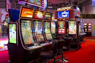 crypto casinos mobile app interface showing slot games and live casino options